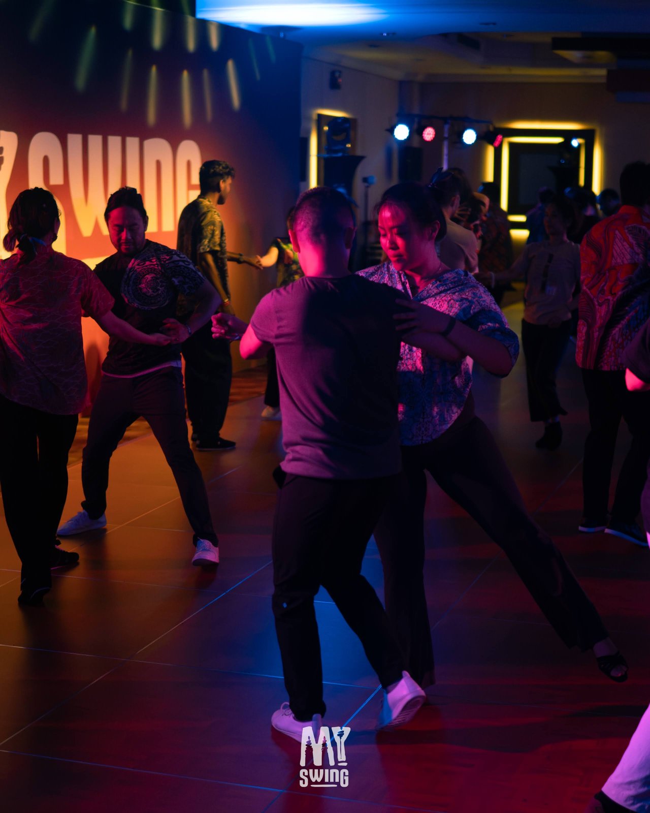 Several couples enjoy social dancing together at MY Swing 2025