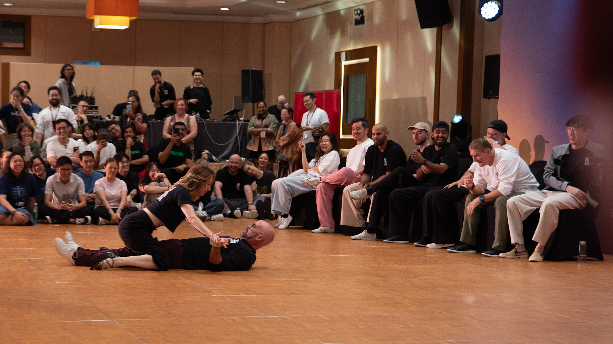 A wide view of the MY Swing audience surrounding a performance.