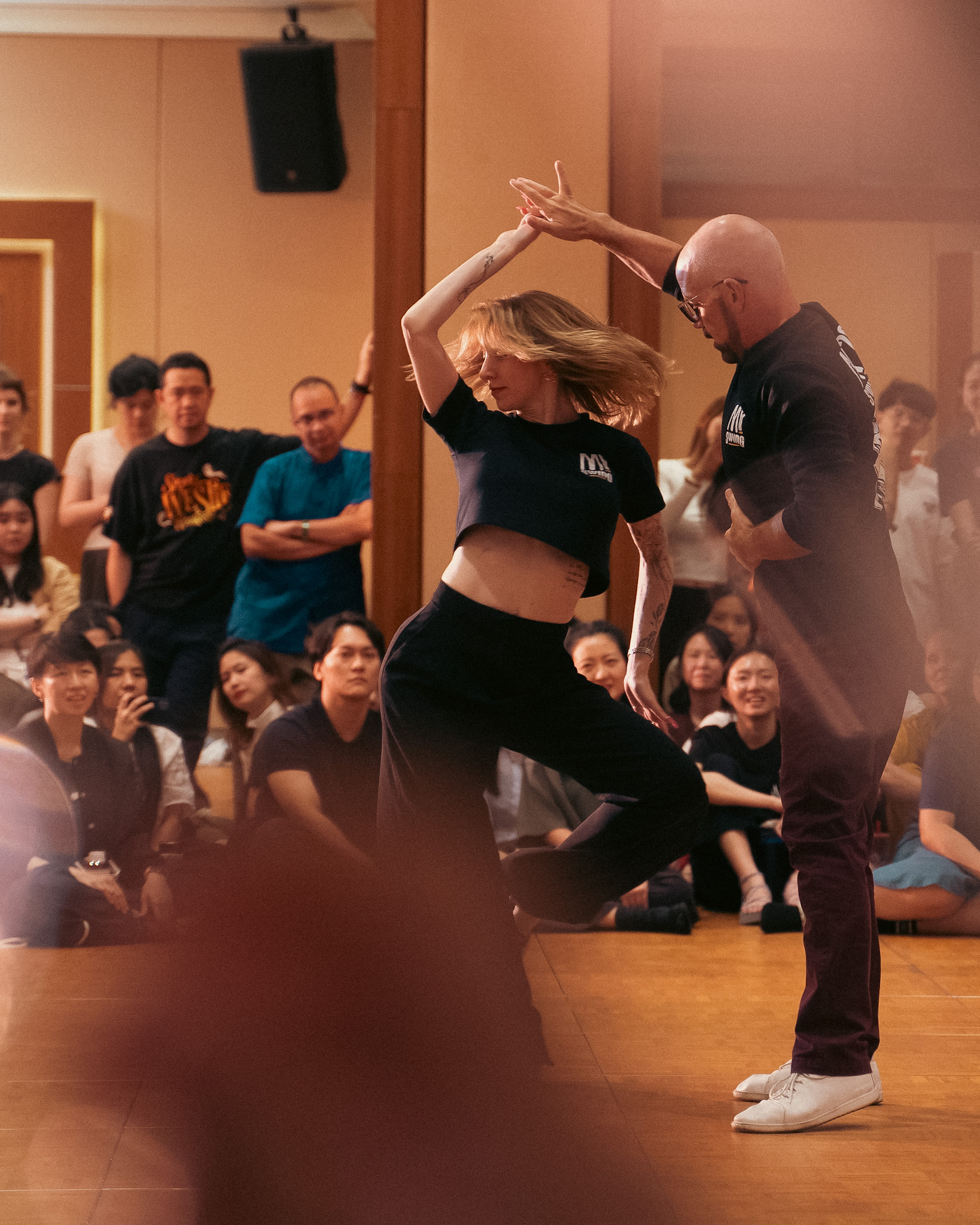 A pair turns together during a showcase performance.
