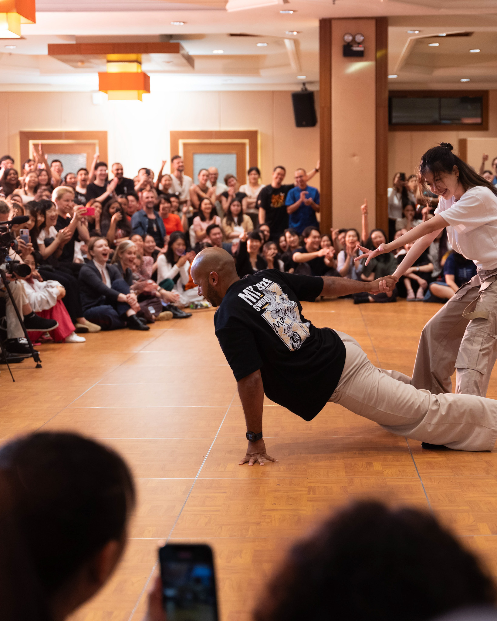 A dancer lunges low during the Pro Invitational.