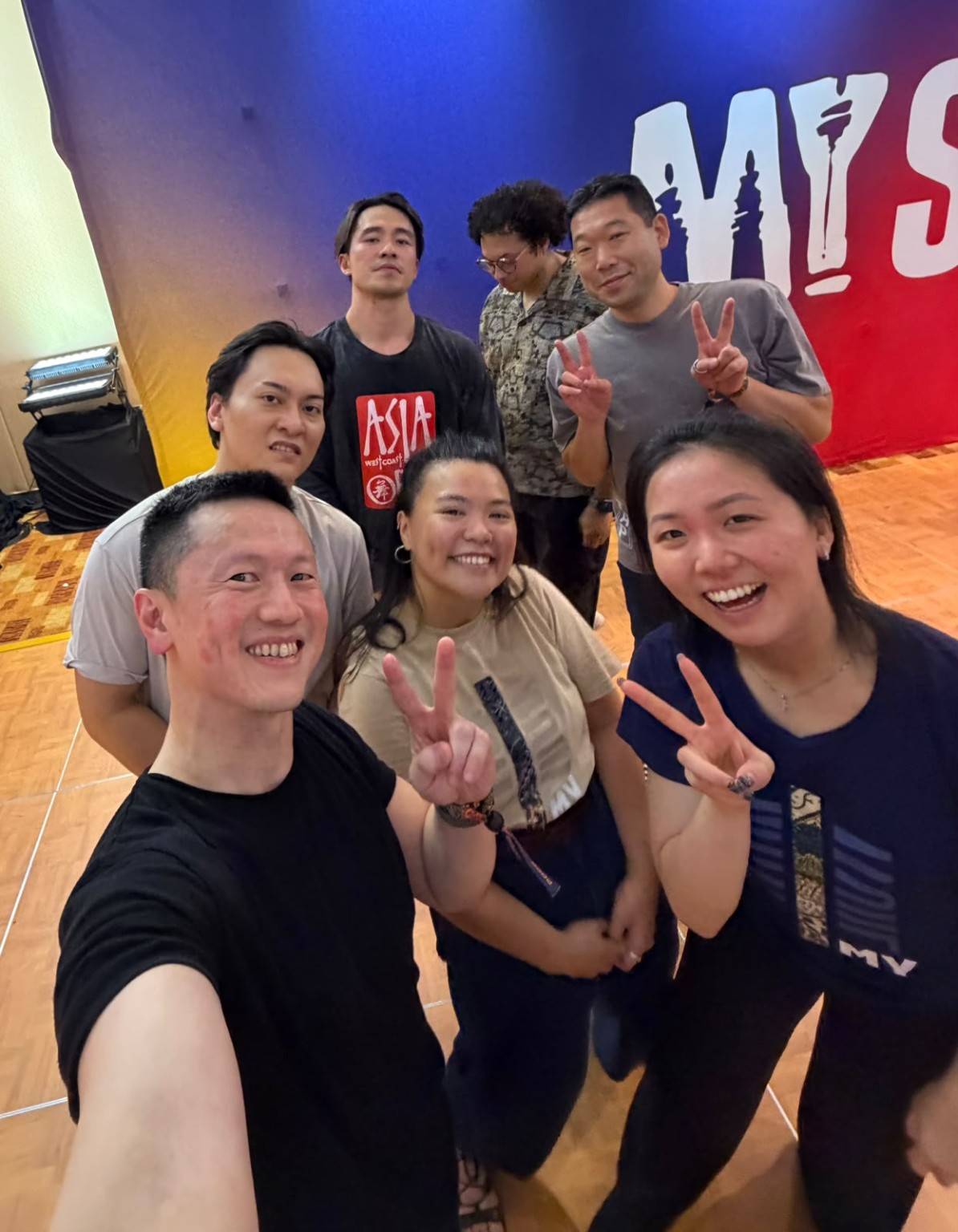 Friends take a selfie together at the MY Swing 2026 backdrop.