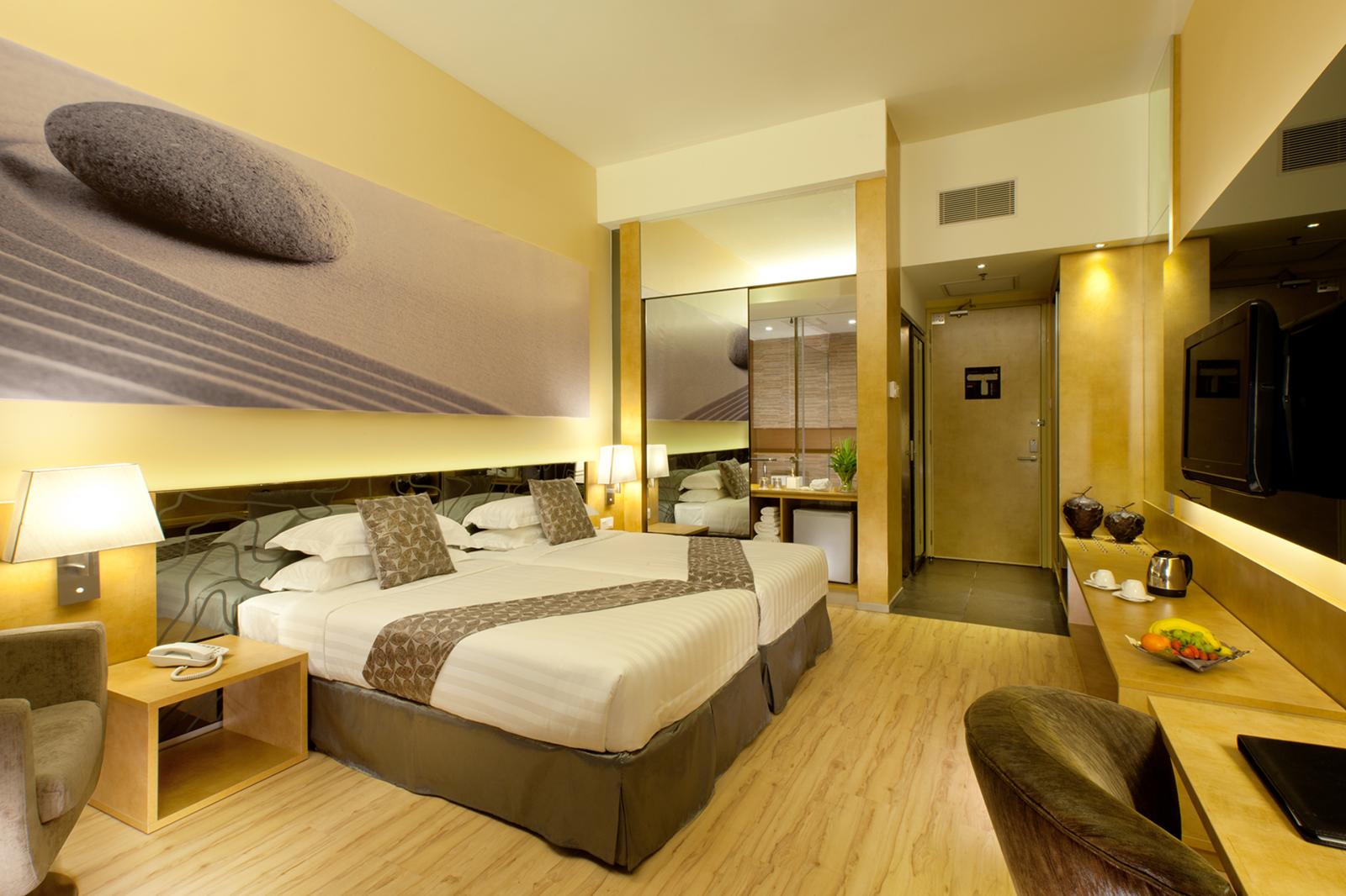 King-bed guest room at Vivatel Kuala Lumpur with earth-inspired interiors